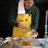 Chef serving baked dishes at an In Autumn tasting table